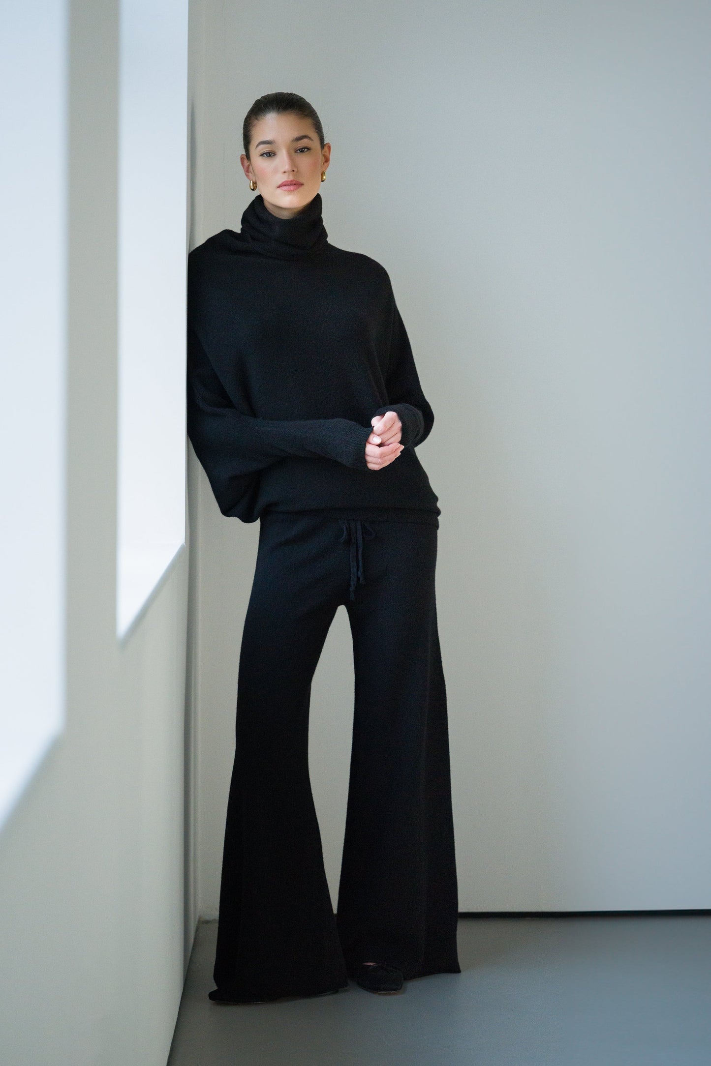 Asymmetric Draped Roll Neck | Black | Seamless Knit