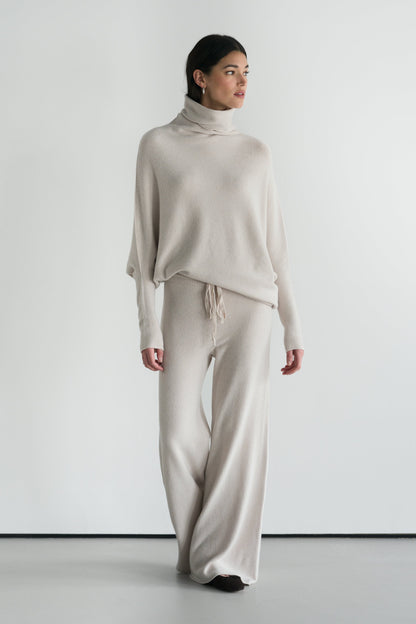 Asymmetric Draped Roll Neck | Light Beige | Seamless Knit