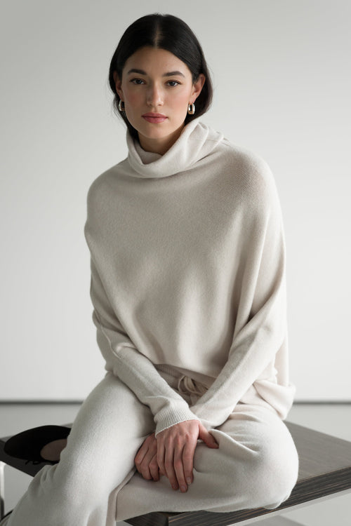 Asymmetric Draped Roll Neck | Light Beige | Seamless Knit