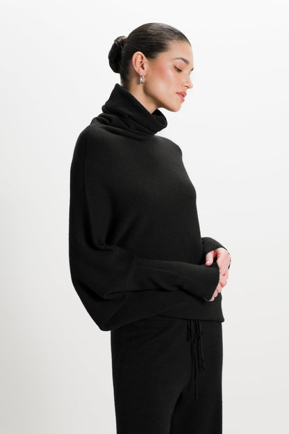 Asymmetric Draped Roll Neck | Black | Seamless Knit